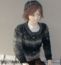 Doll in gray knit
