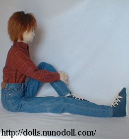 Doll in jeans