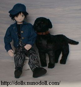 Doll and black dog