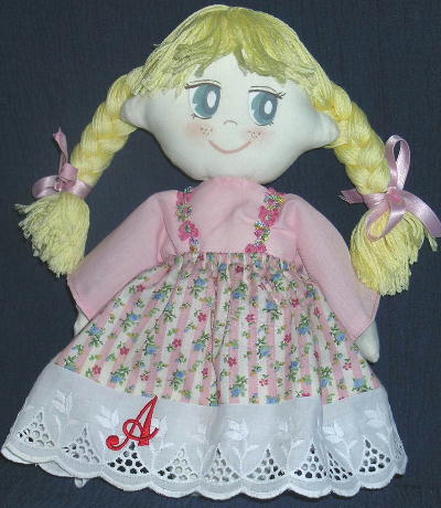 Mini doll with blonde plait