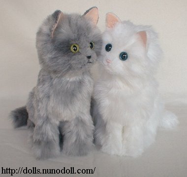 grey and white stuffed cat